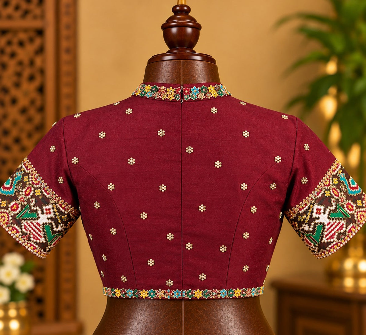 Maroon Beaded Blouse with Red Patola Lehenga, view
