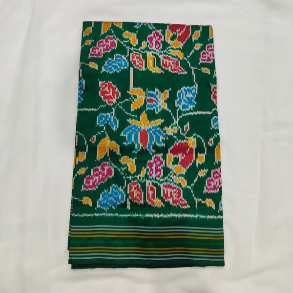 Emerald green ikat silk saree with multicolour floral motifs and a green and gold striped border